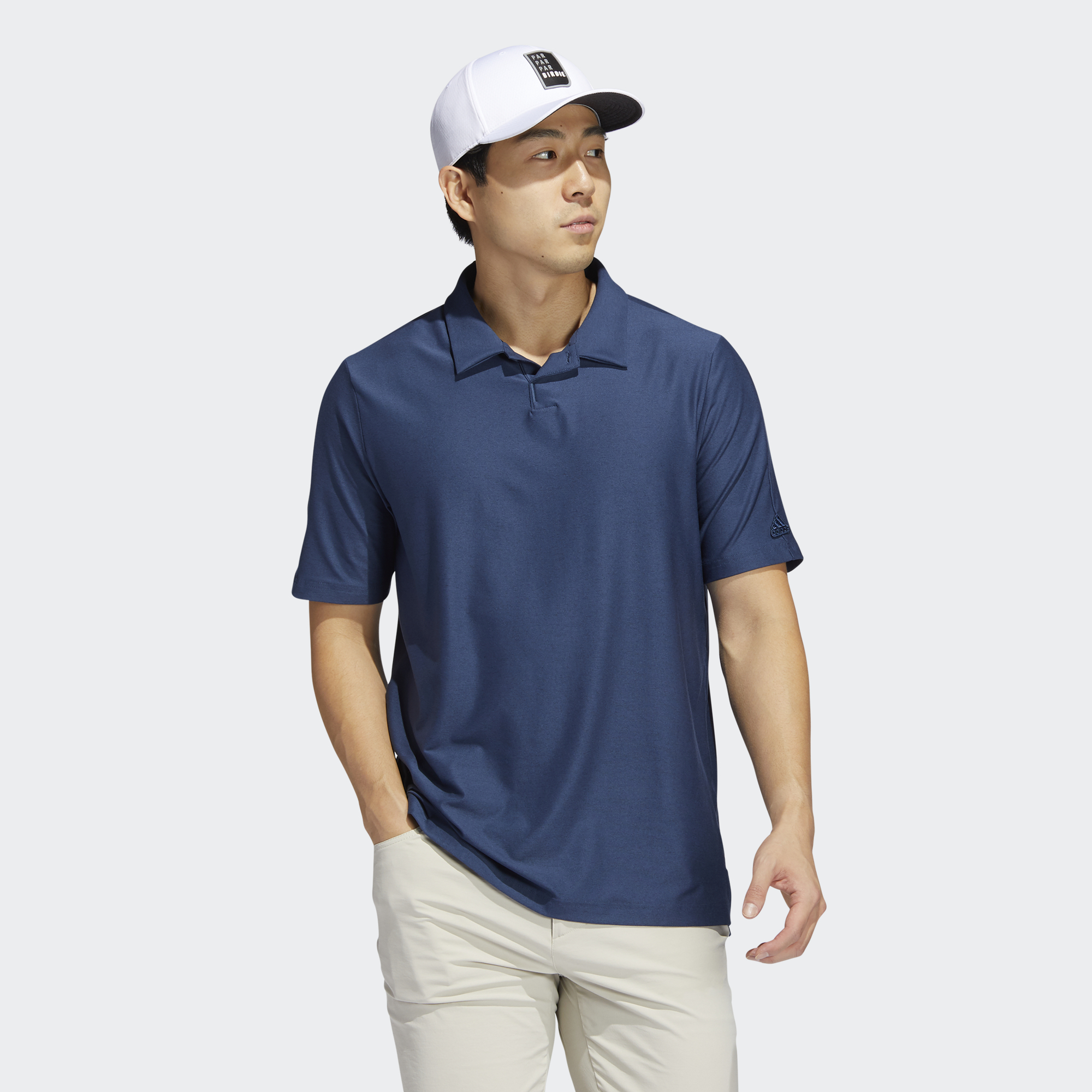 polo shirt and hat